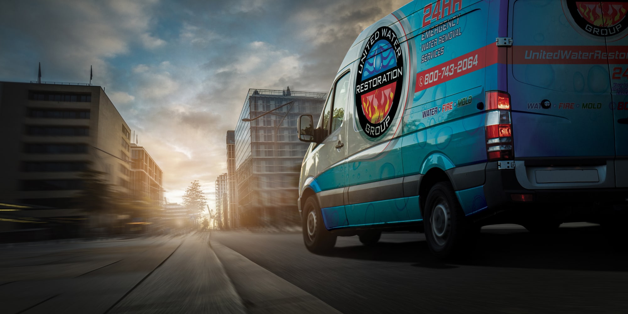A UWRG of East Grand Rapids van heading out on an emergency call at sunset